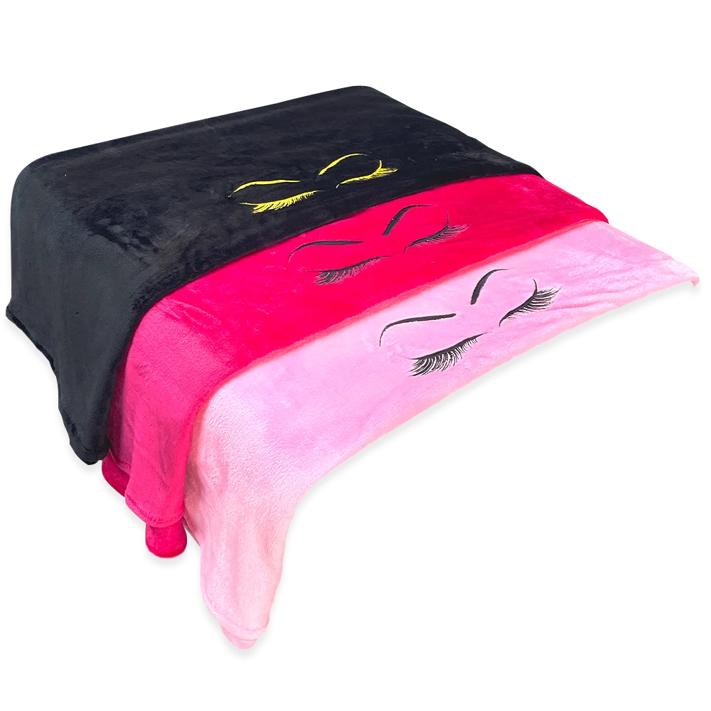 COBIJA CON DISEÑO DE PESTAÑAS PARA CAMILLA